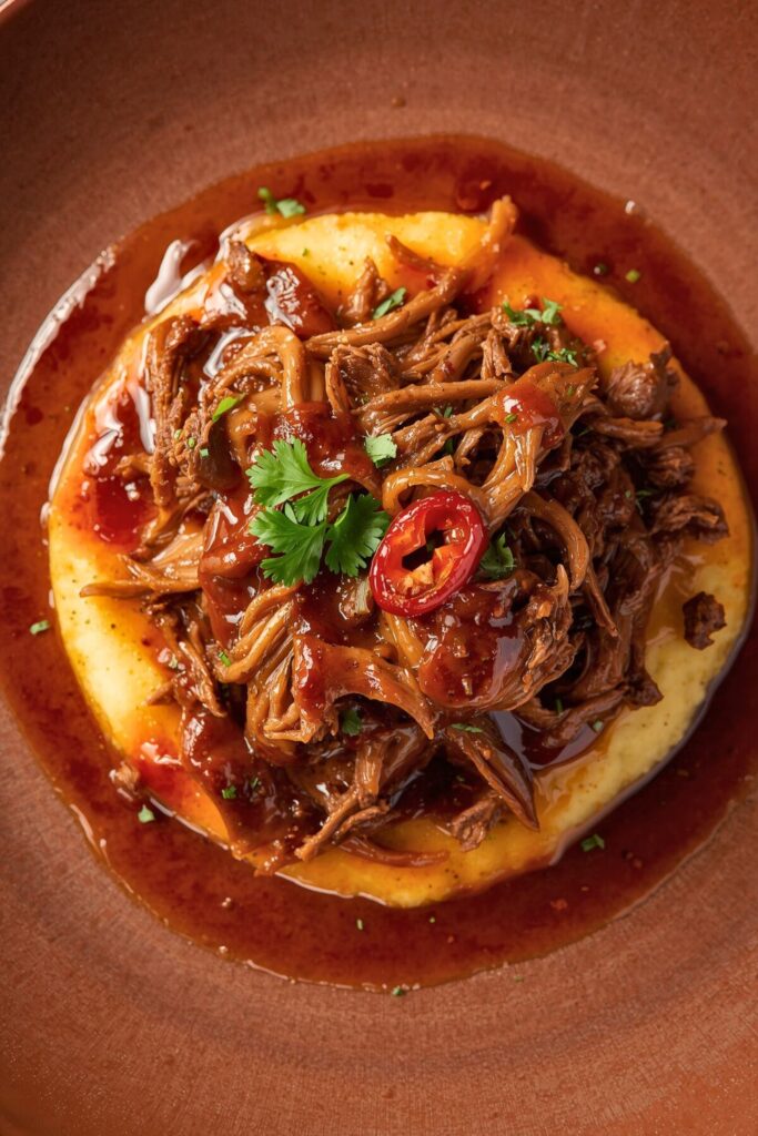 Caramelized Pulled Beef Brisket In A Rich Spicy Sauce