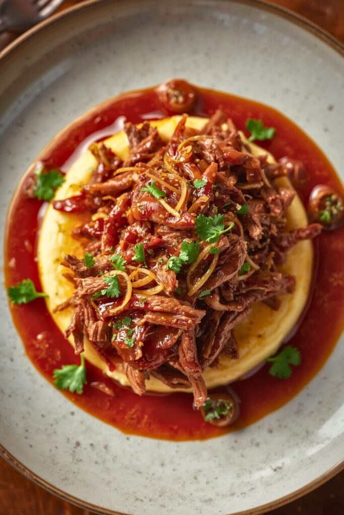 Caramelized Pulled Beef Brisket In A Rich Spicy Sauce